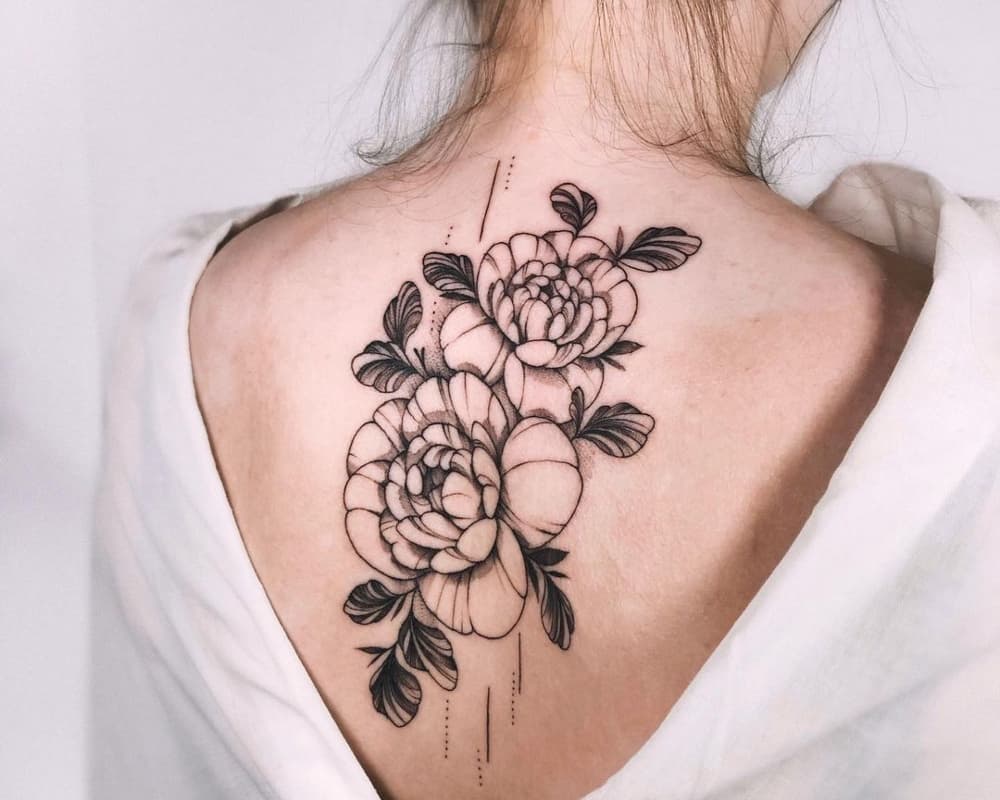 Tattoo of peonies on the back