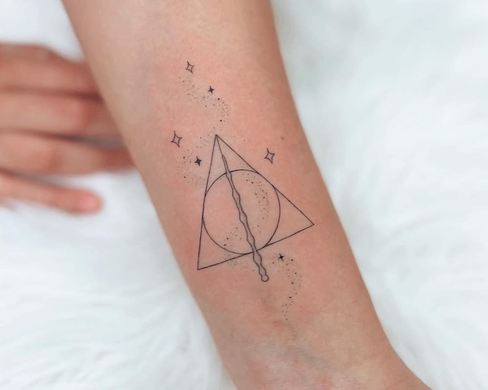 Tattoo of the Deathly Hallows and stars