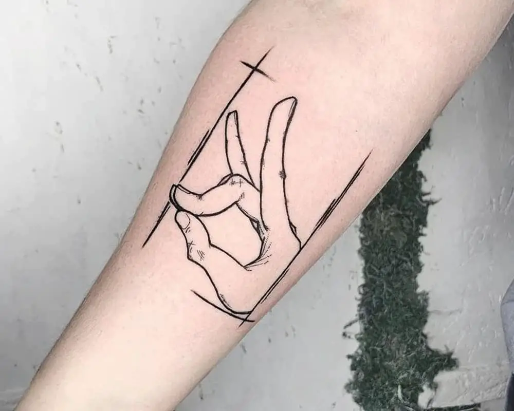 Tattoo of the Kon folded hand gesture