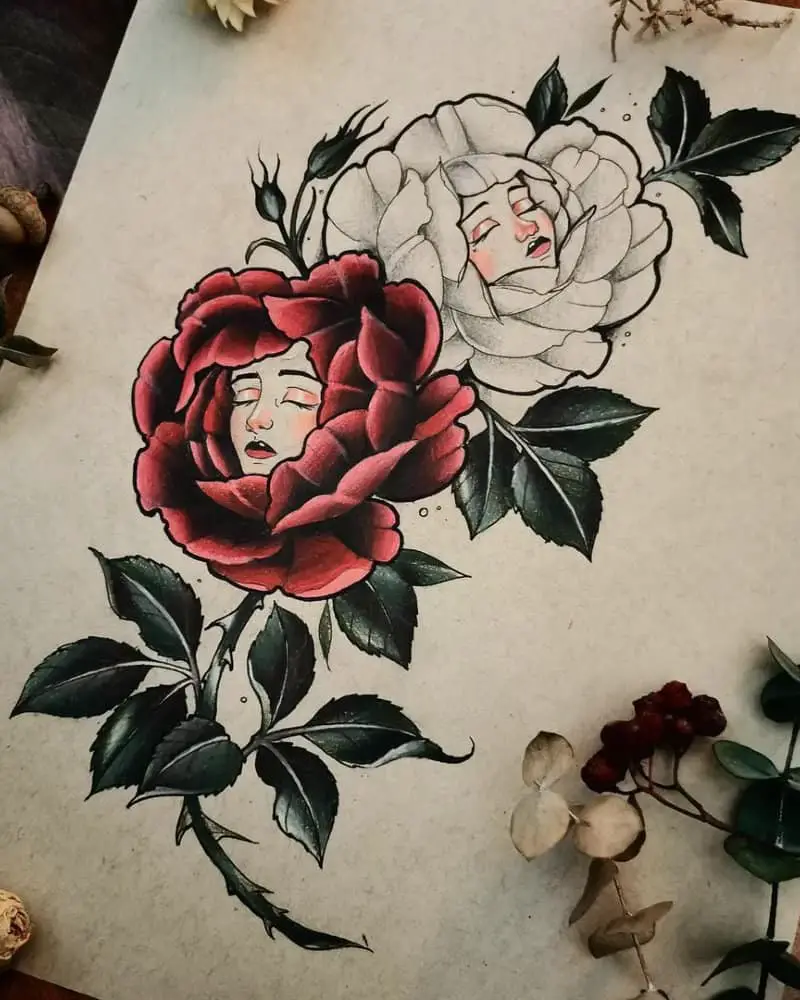 Tattoo of two roses with girls' faces