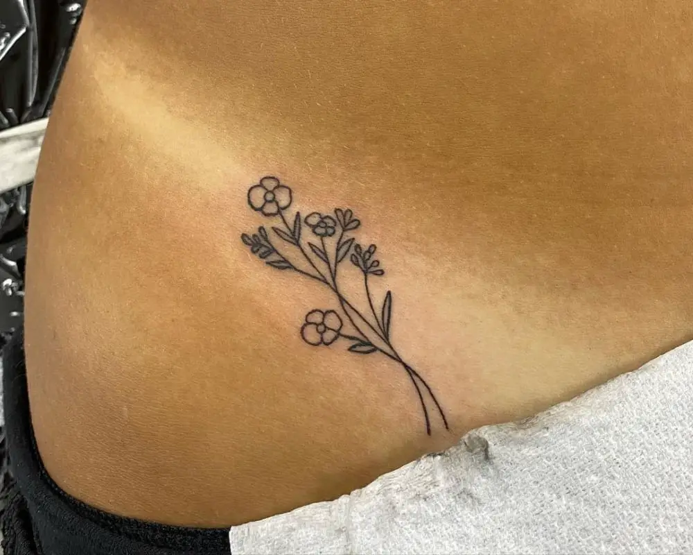 Tattoo small sprigs of flowers