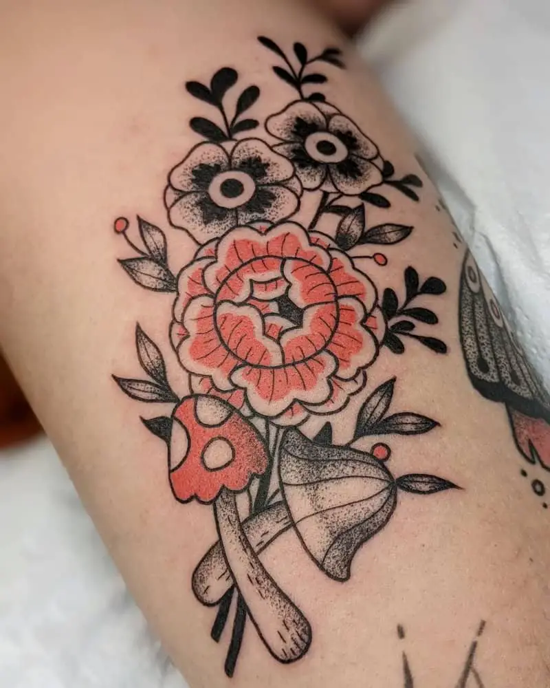 Tattoo with flowers and mushrooms