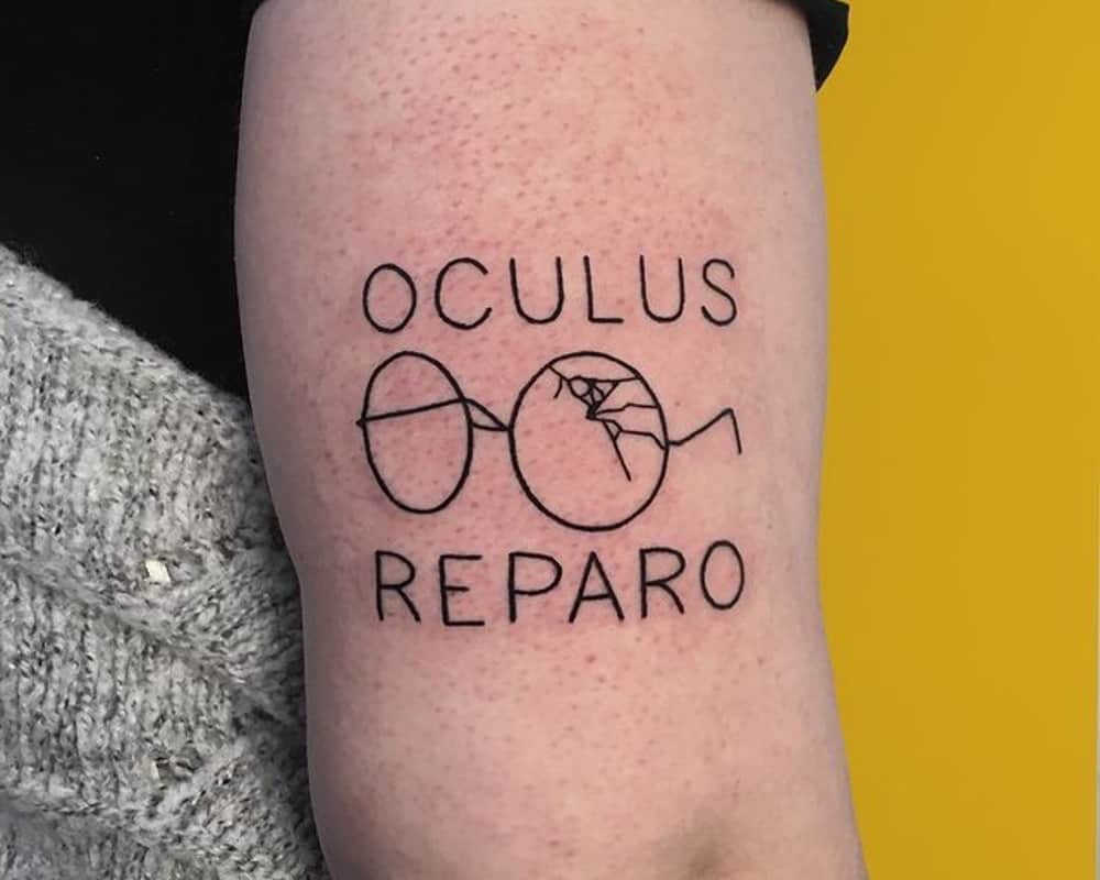 Tattoos of Harry's glasses and the inscription oculus reparo