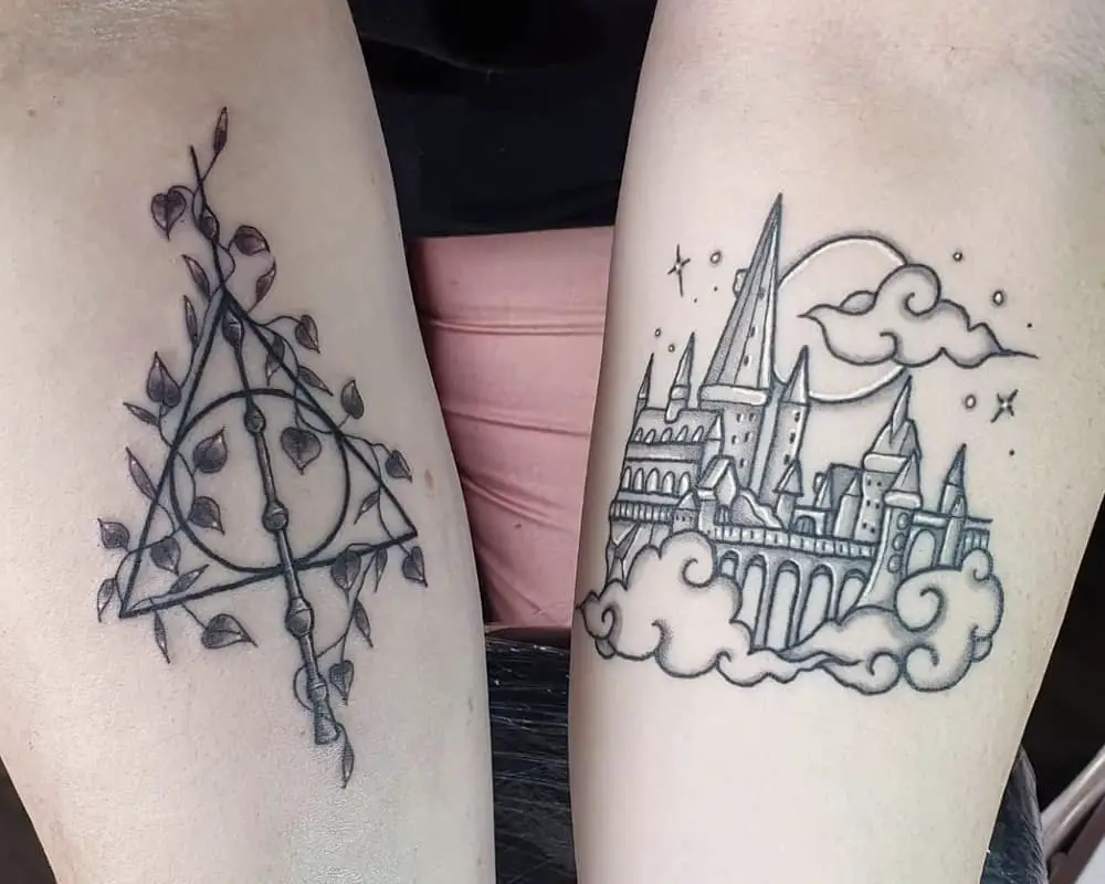 Tattoos on one arm sign of the Deathly Hallows on the other Hogwarts