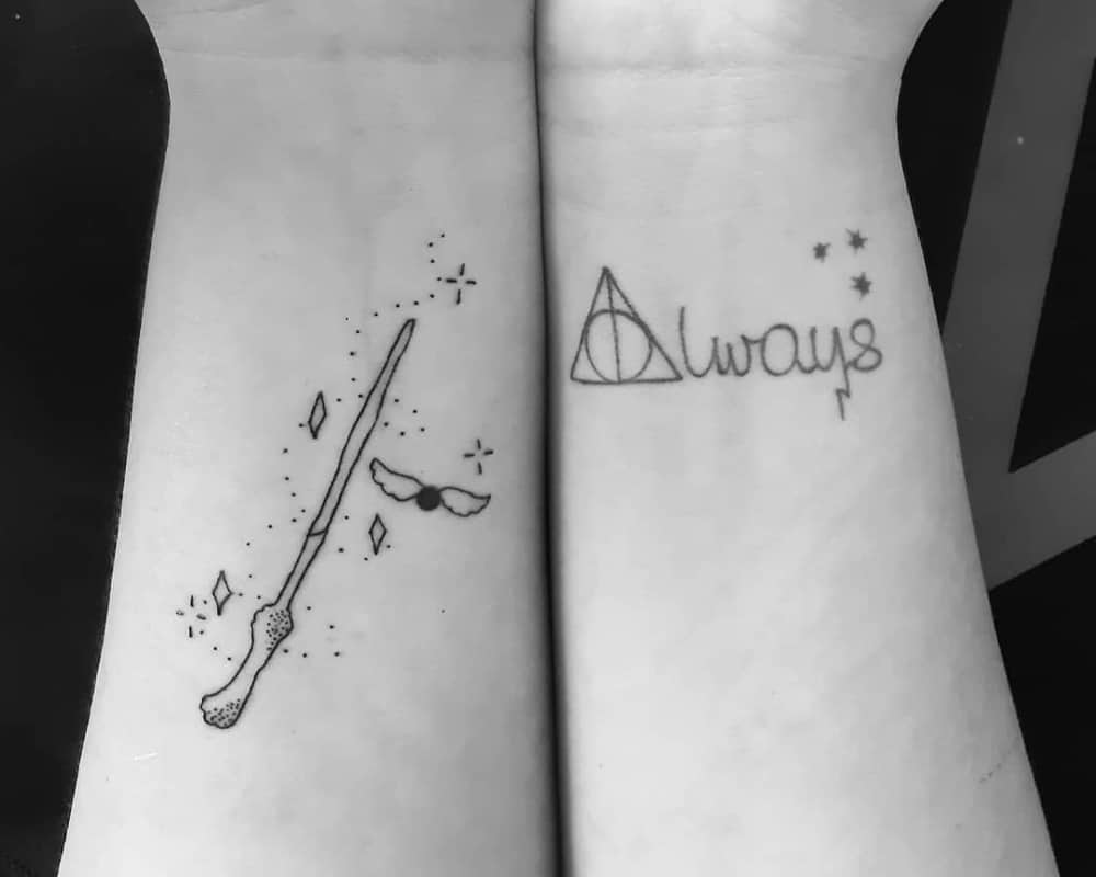 Tattoos on two arms in the form of a broom and the sign of the Deathly Hallows