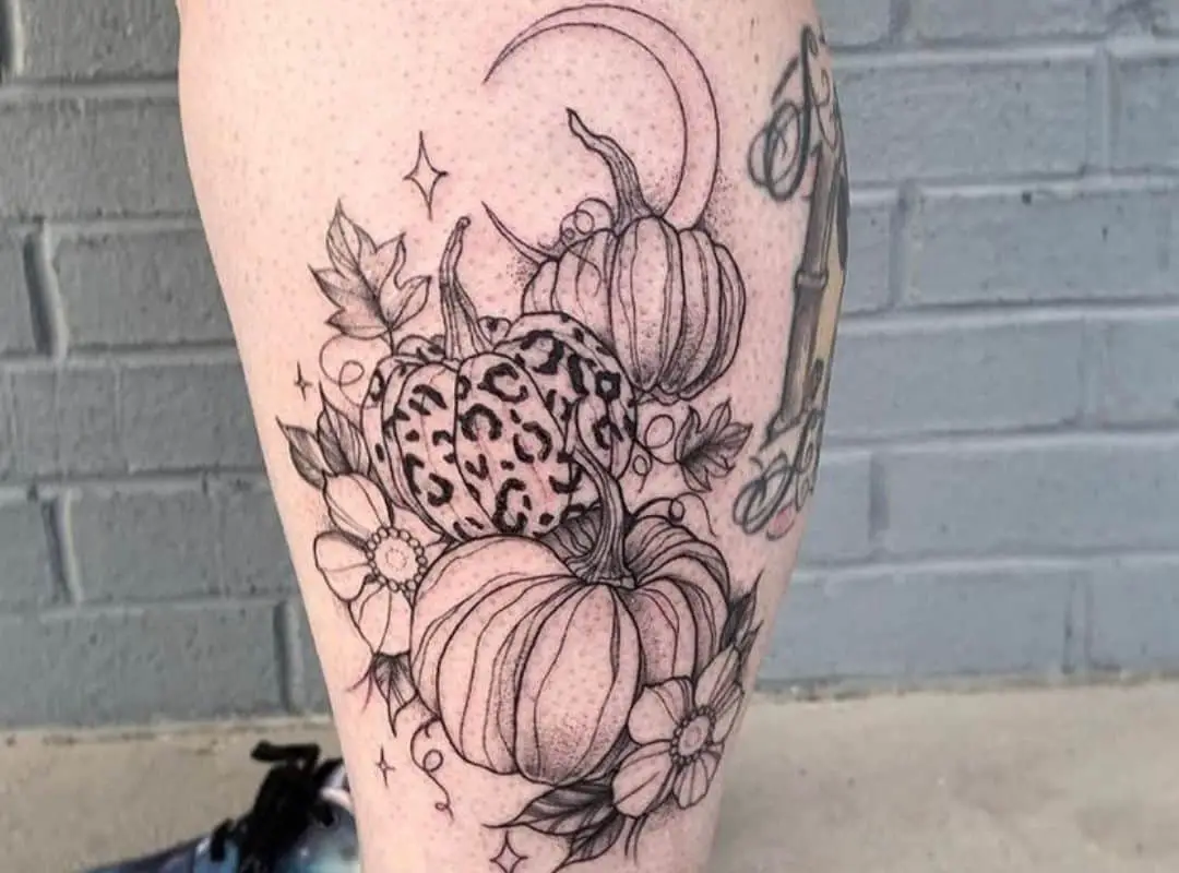 3 traditional pumpkins with the moon tattoo