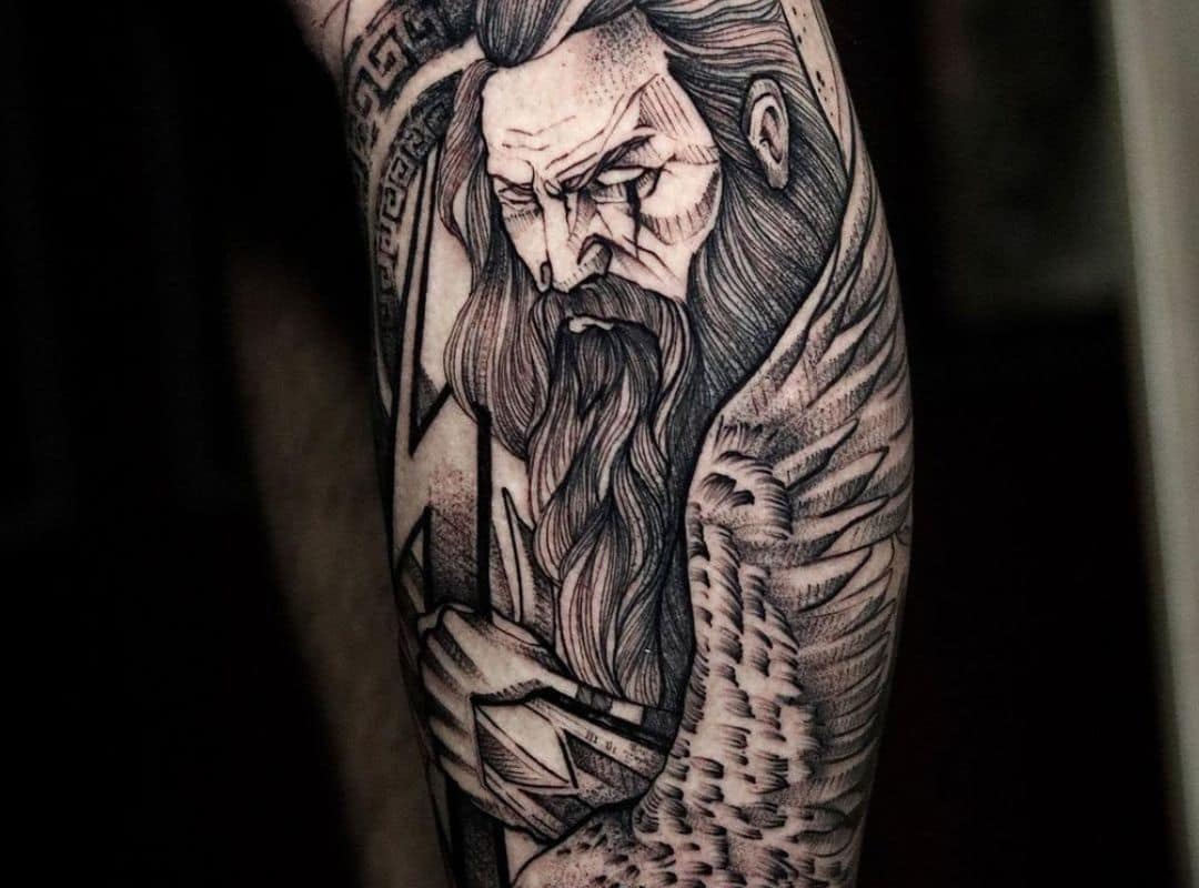Viking and bird tattoo