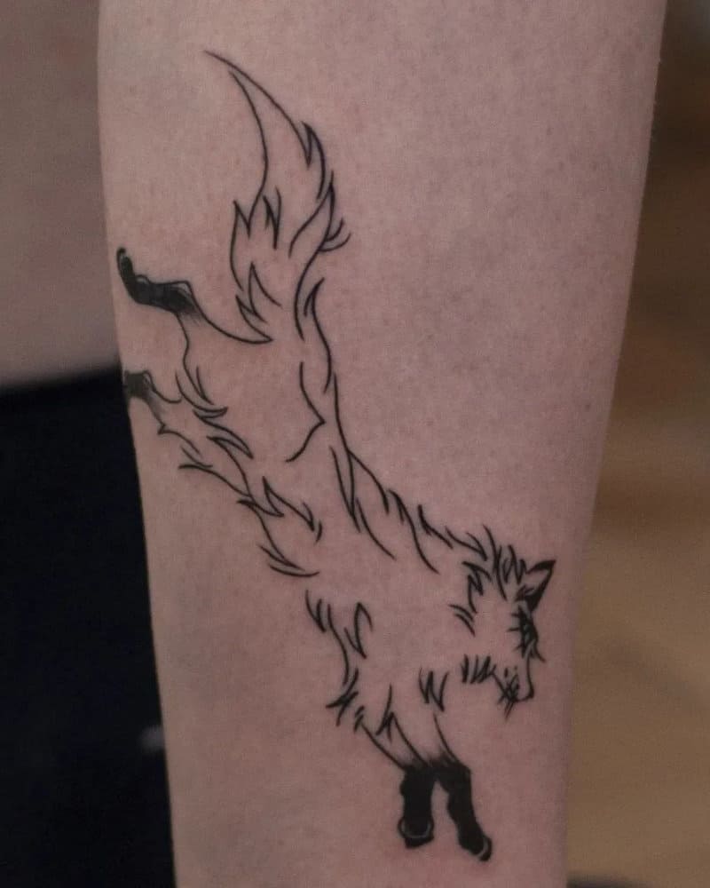 a tattoo of a bouncing furry fox