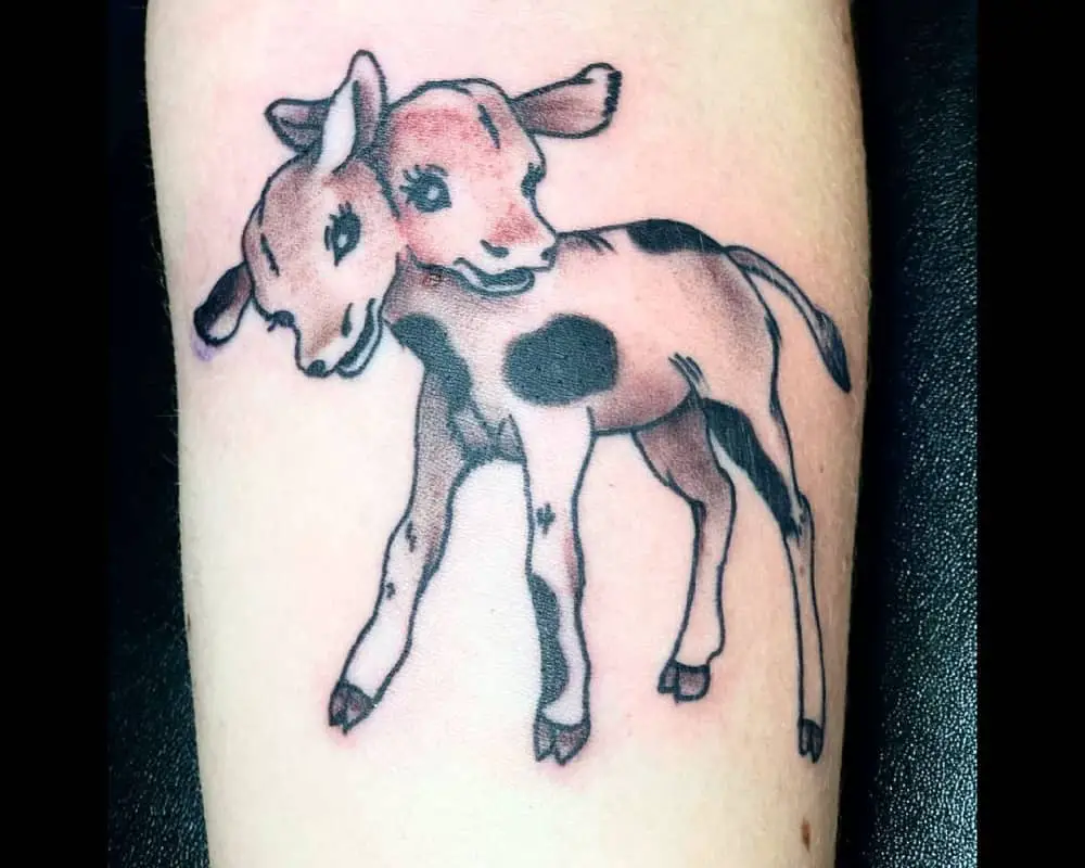 a tattoo of a spotted two-headed calf