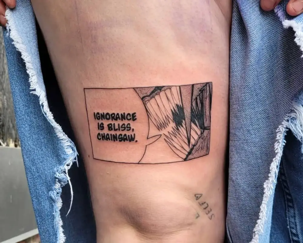 a tattoo of the teeth of the chainsaw man and a replica of ignorance is bliss, chainsaw