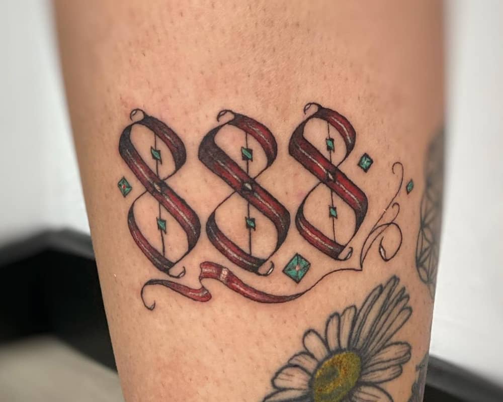 colored tattoo 888 with emeralds