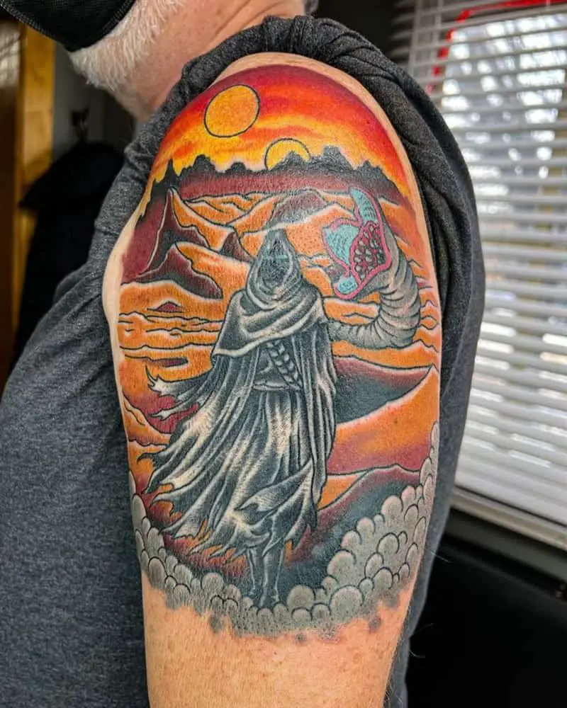 colored tattoo with a man from the Fremen tribe on the Arrakis desert