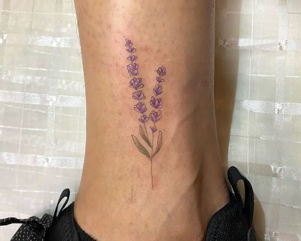 delicate coloured lavender sprig tattoo
