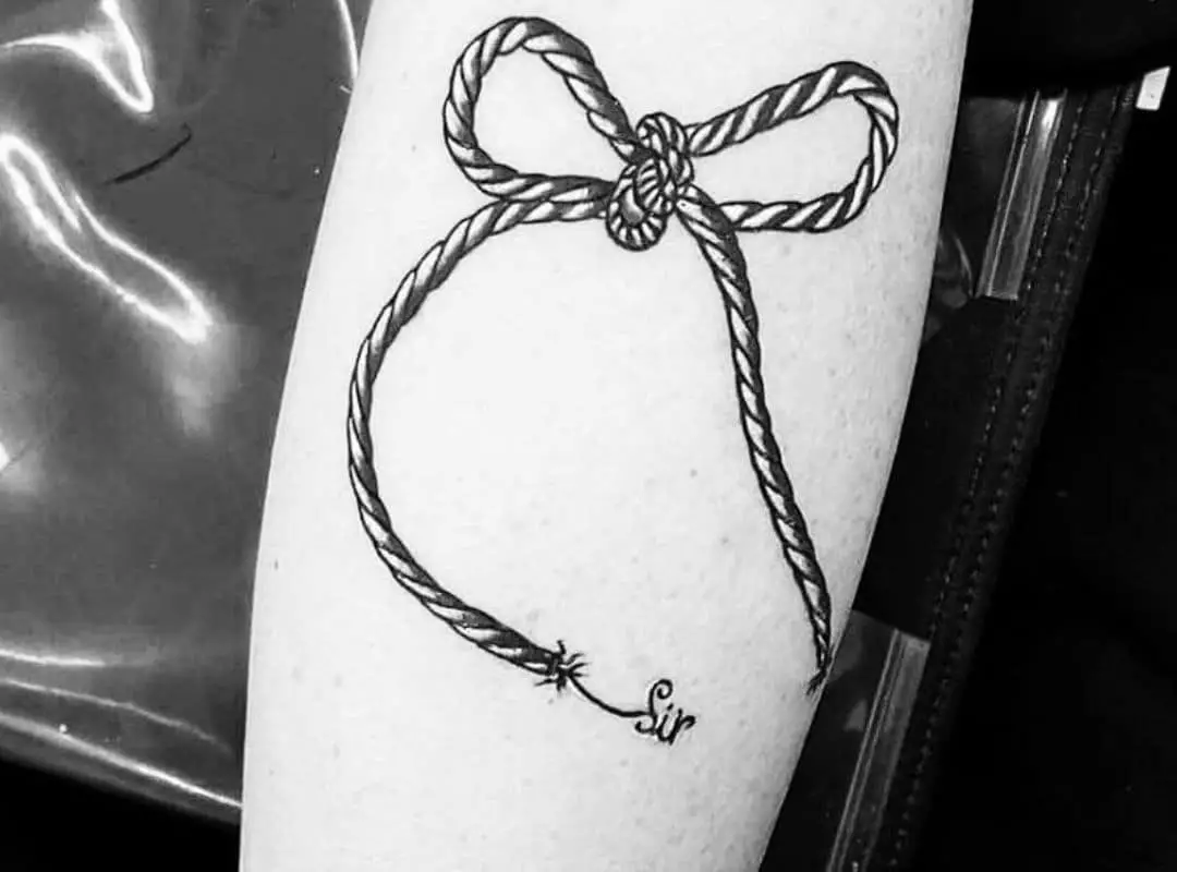 Rope tied in a bow tattoo