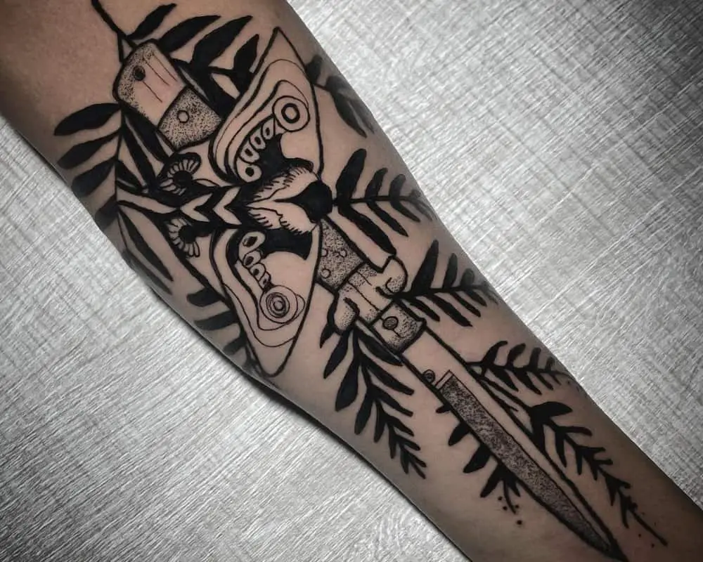 tattoo butterfly knife and plants