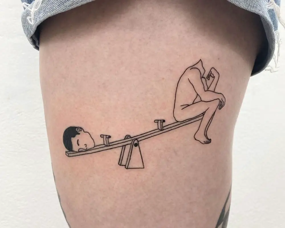 tattoo in the form of a body sitting on a swing and on the other side lies the head