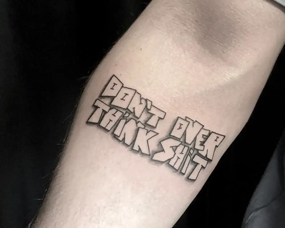 tattoo in the shape of don't over think shit