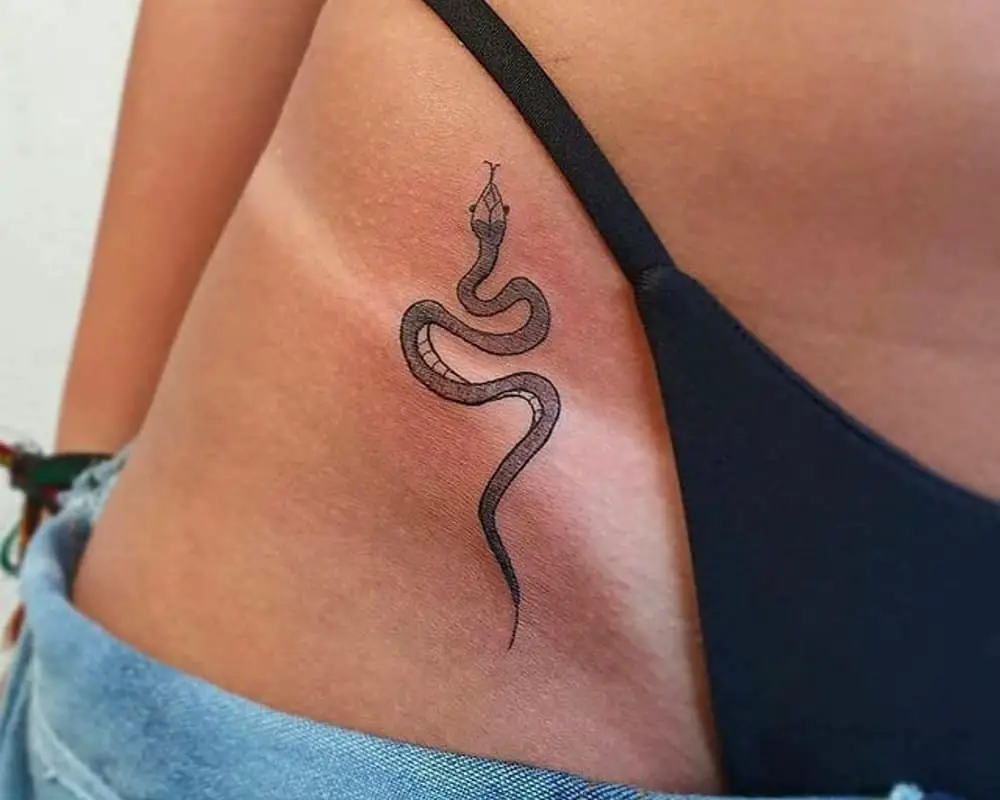 tattoo of a crawling snake