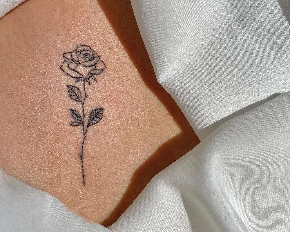 tattoo of a lone rose