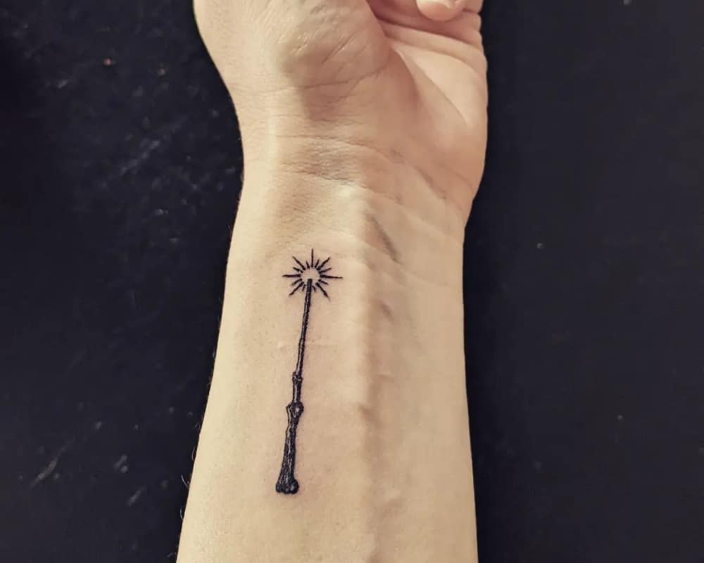 tattoo of a magic wand