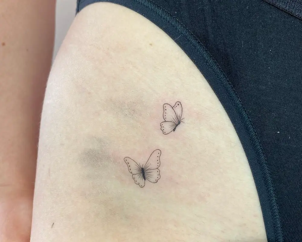 tattoo of two small butterflies