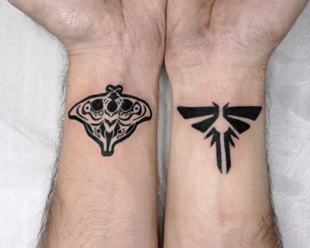 tattoo on two hands cicada and cicada symbol