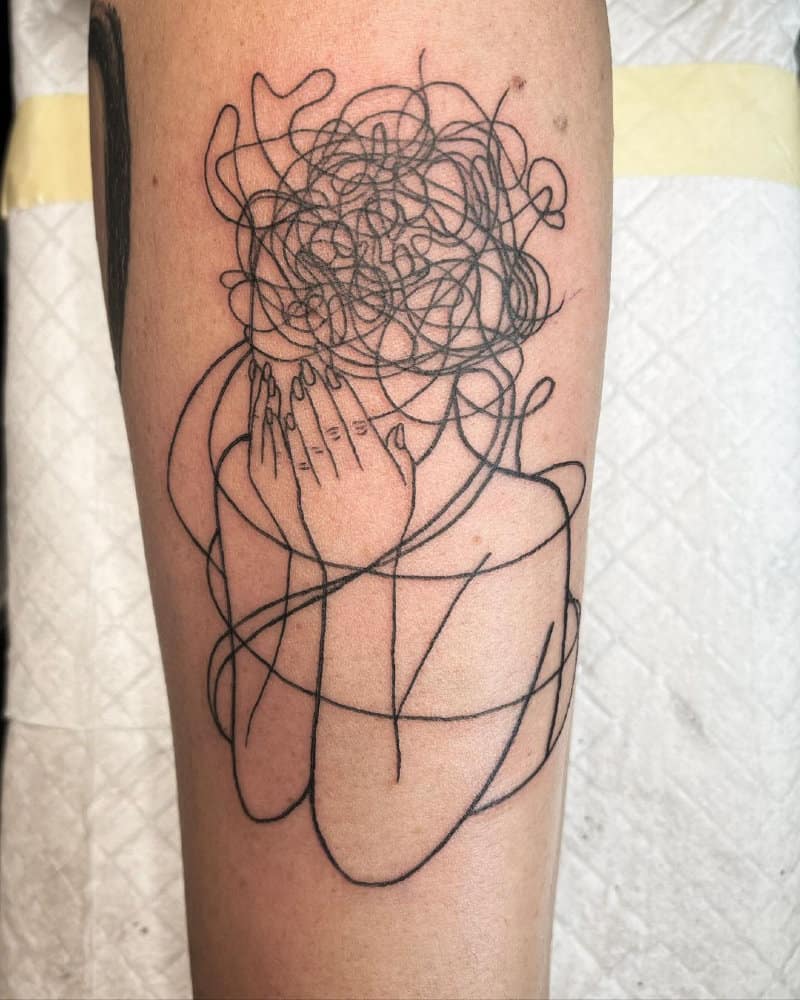 tattoo silhouette of a girl in tangled threads