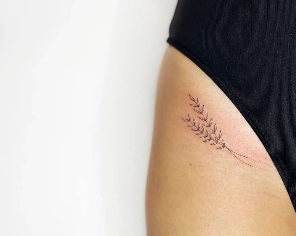 tattoo two branches with leaves