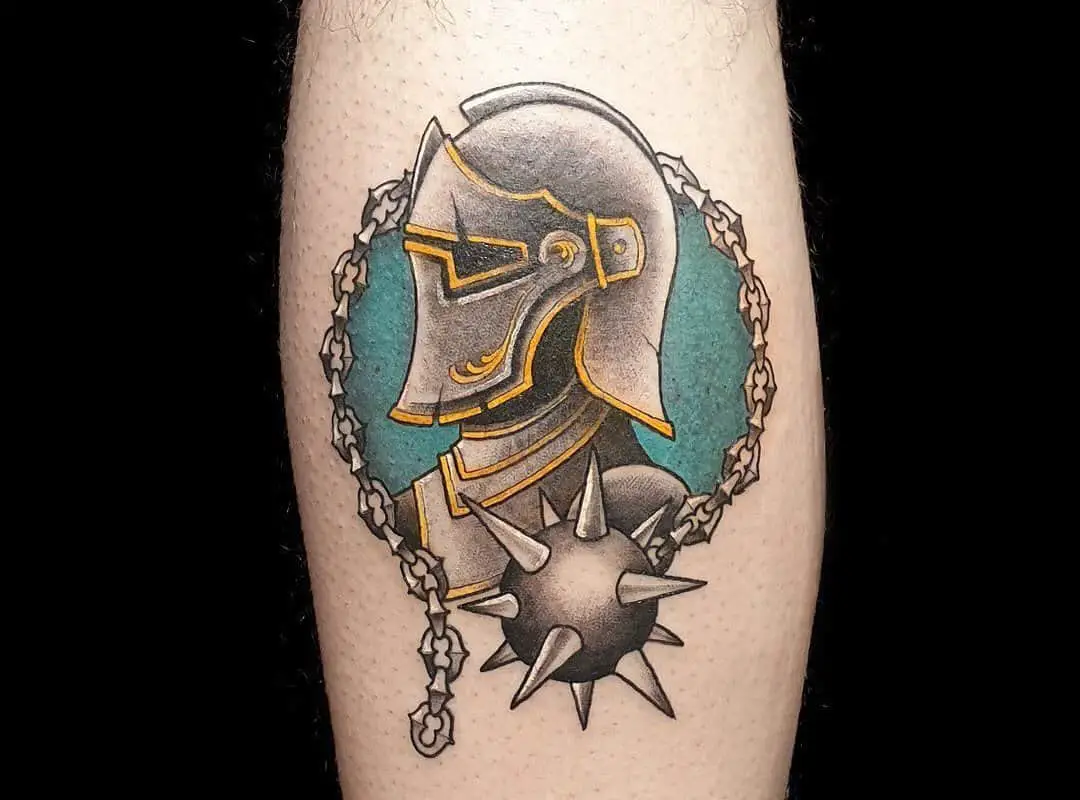 colored helmet tattoo in chain rim with bullwhip