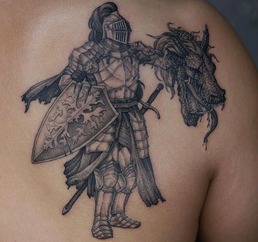 Tattoo with a knight holding a severed dragon's head