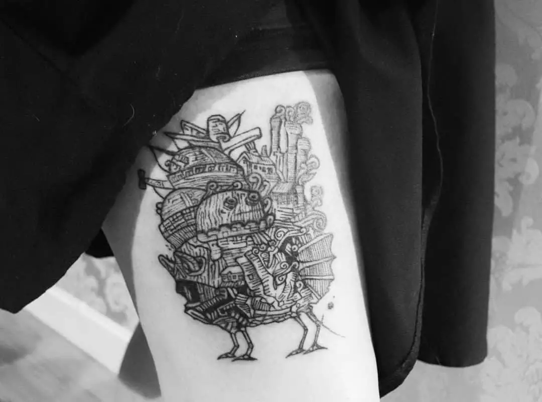 A tattoo of a walking castle on the triceps