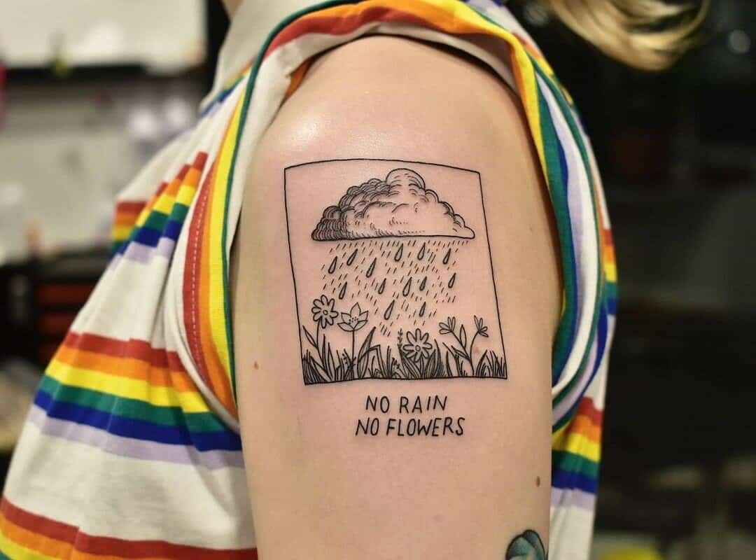 "no rain no flowers tattoo" on shoulder