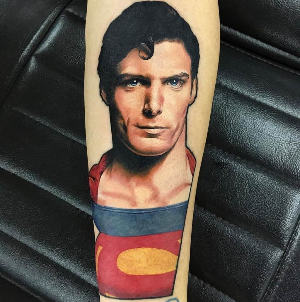 Superman's photographic face tattoo