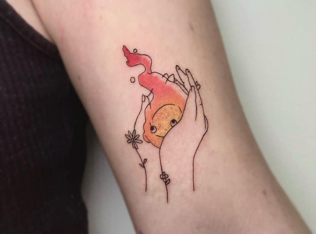 Calcifer tattoo lies in the palms of your hands