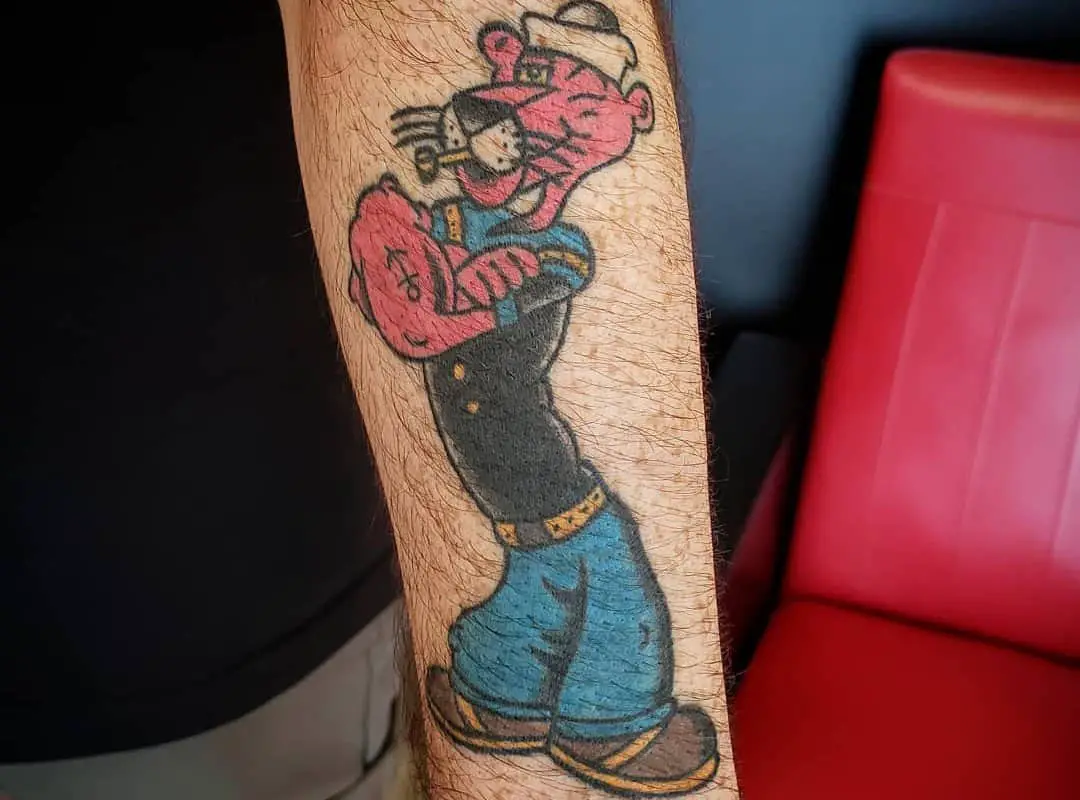 Pink panther tattoo in the image of a Popeye sailor