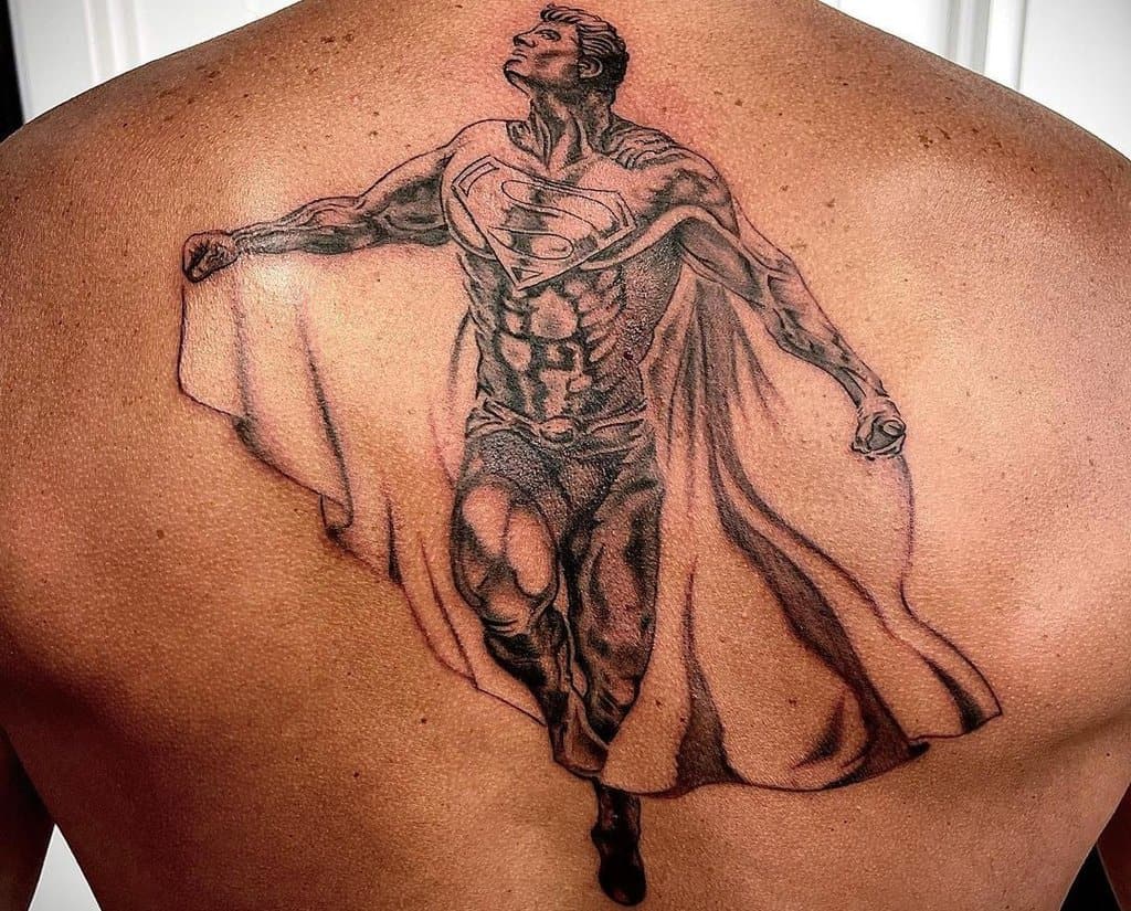 Superman tattoo on his back