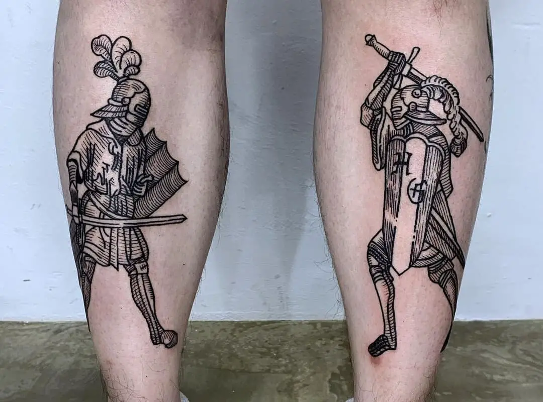two knights tattooed on the left and right leg