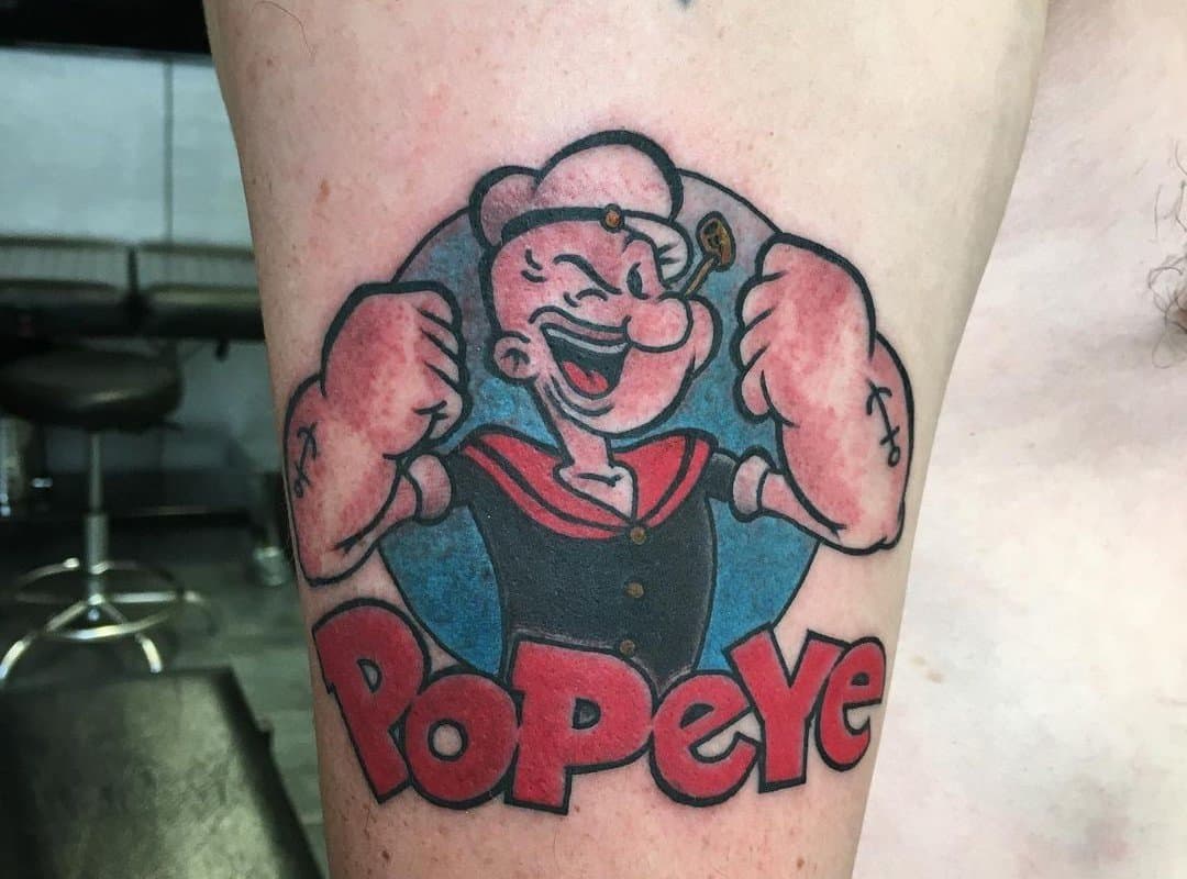 Sailor Popeye tattoo showing his fists