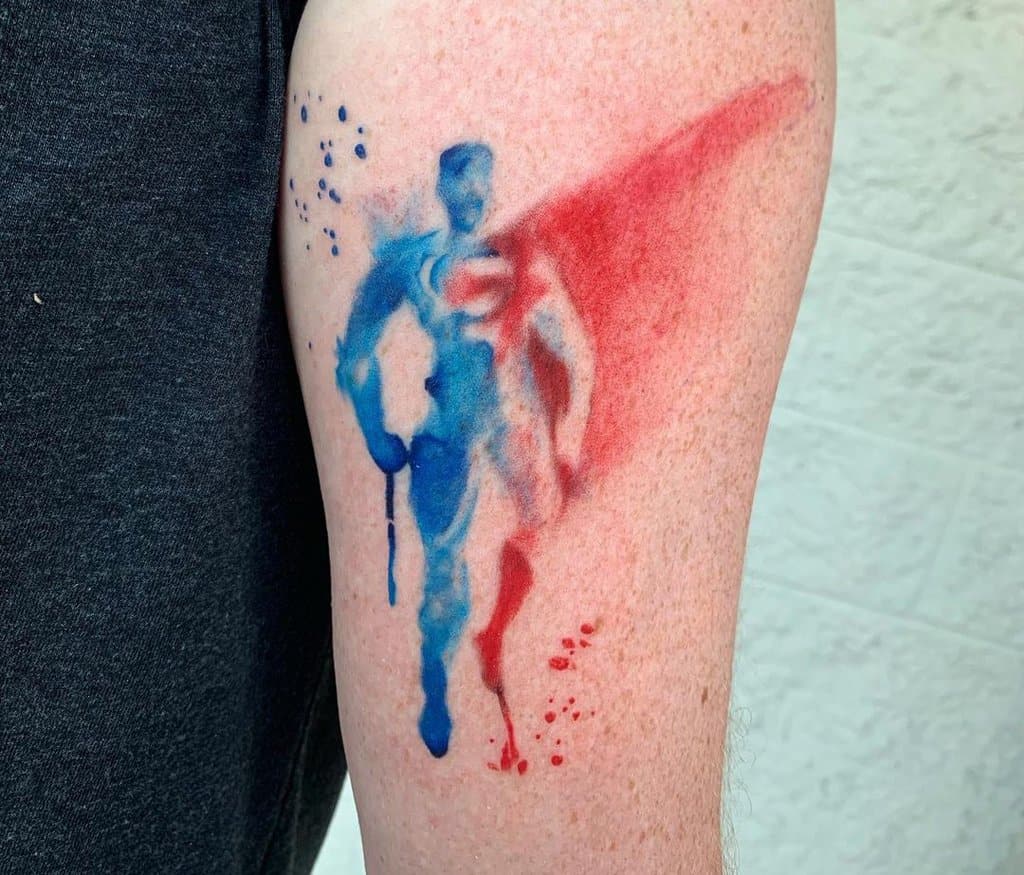 superman's blue and red tattoo