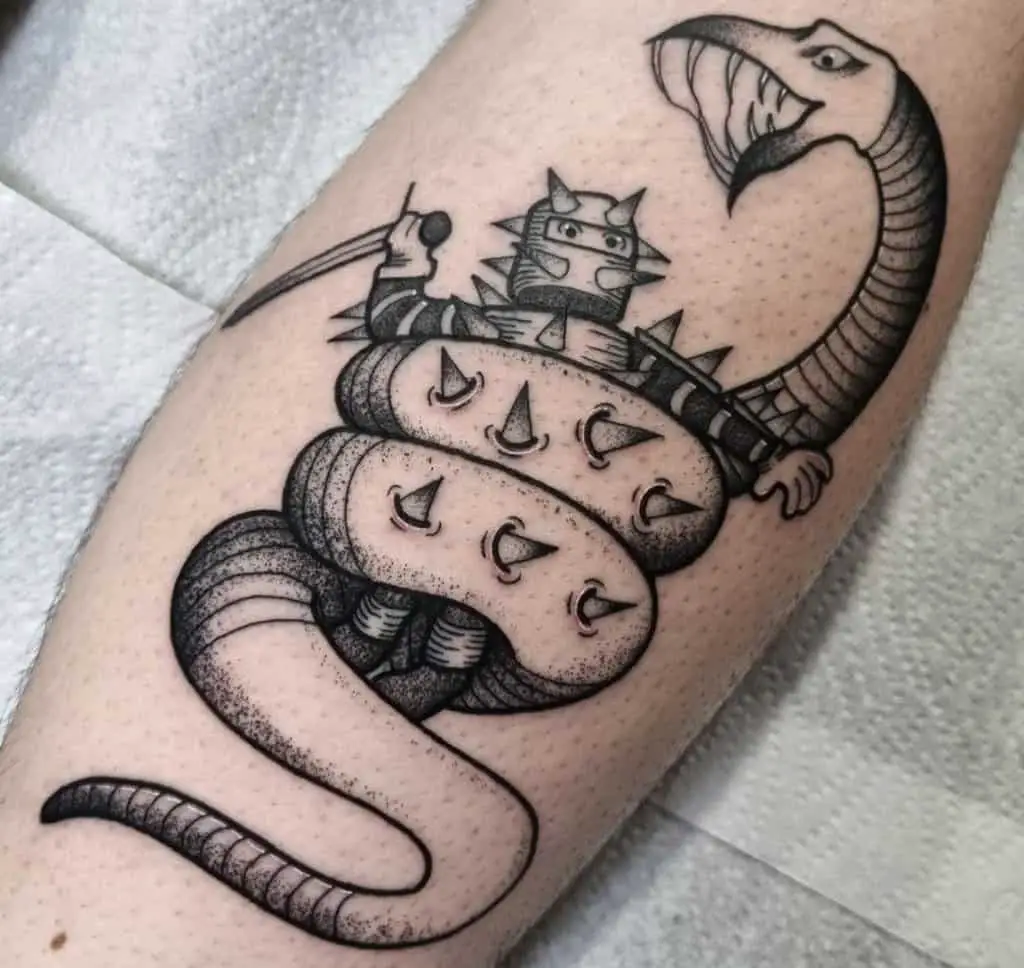 A tattoo of a knight fighting a snake