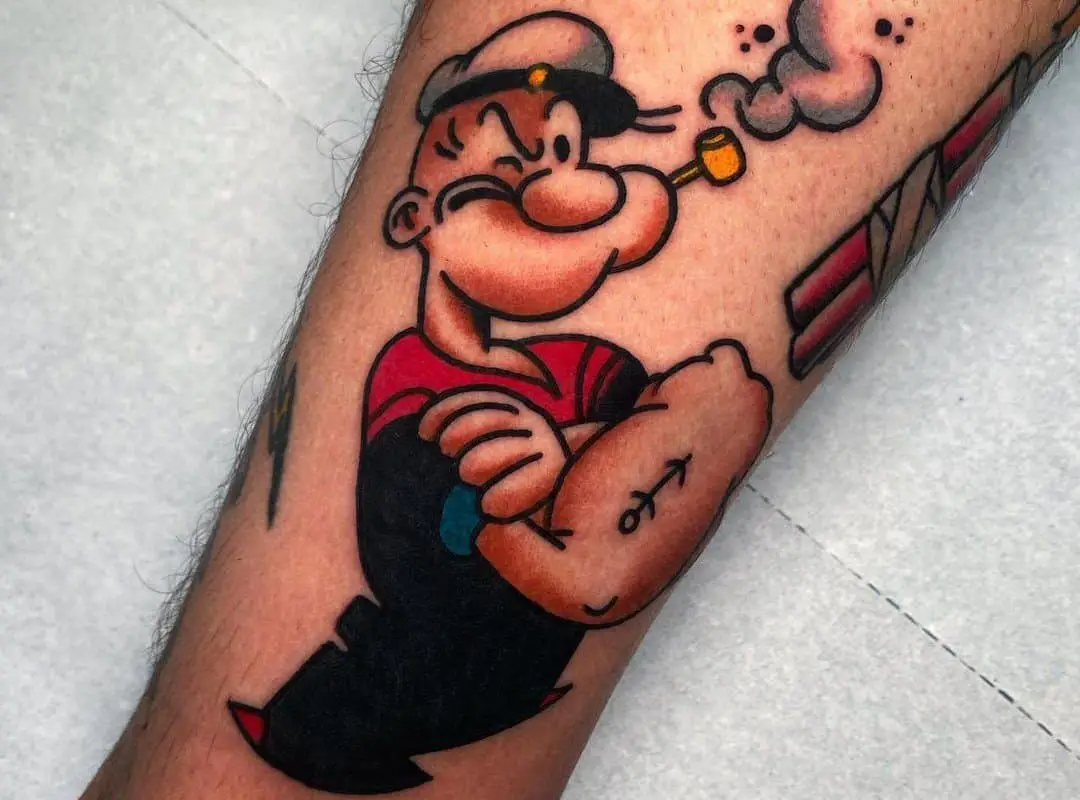 colored tattoo of a sailor Popeye shows his right hand
