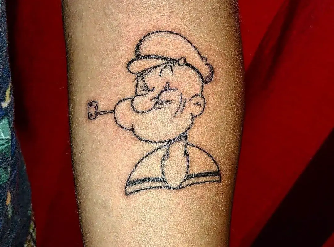 A tattoo with a classic image of a Popeye sailor