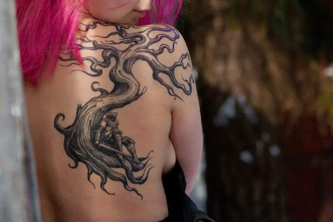 A tattoo of a knight on a girl's back