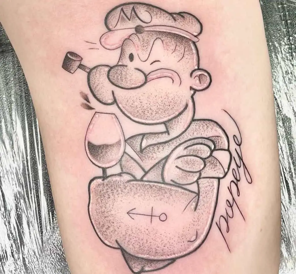 Sailor tattoo of a Popeye with a glass