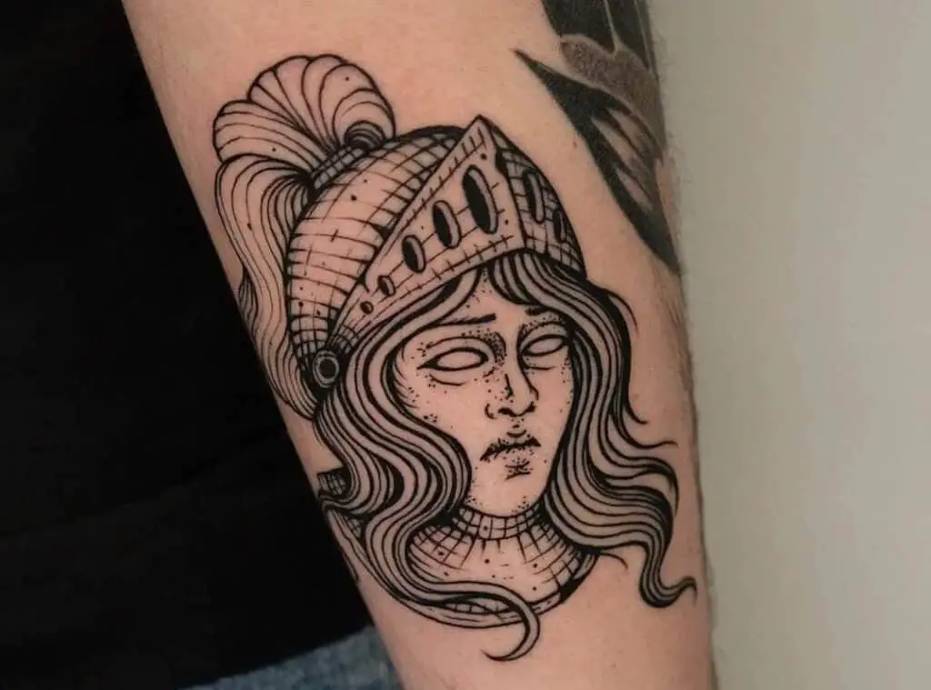 A tattoo knight with a raised visor