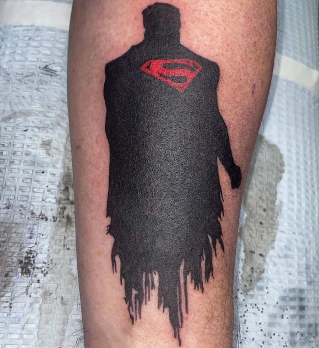 black silhouette supermanf tattoo