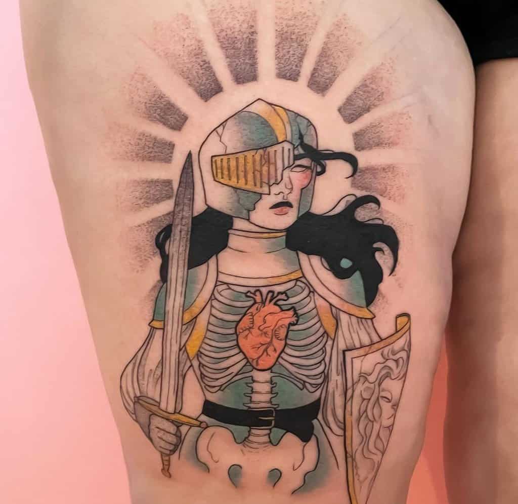 Tattoo of a knight with a broken helmet