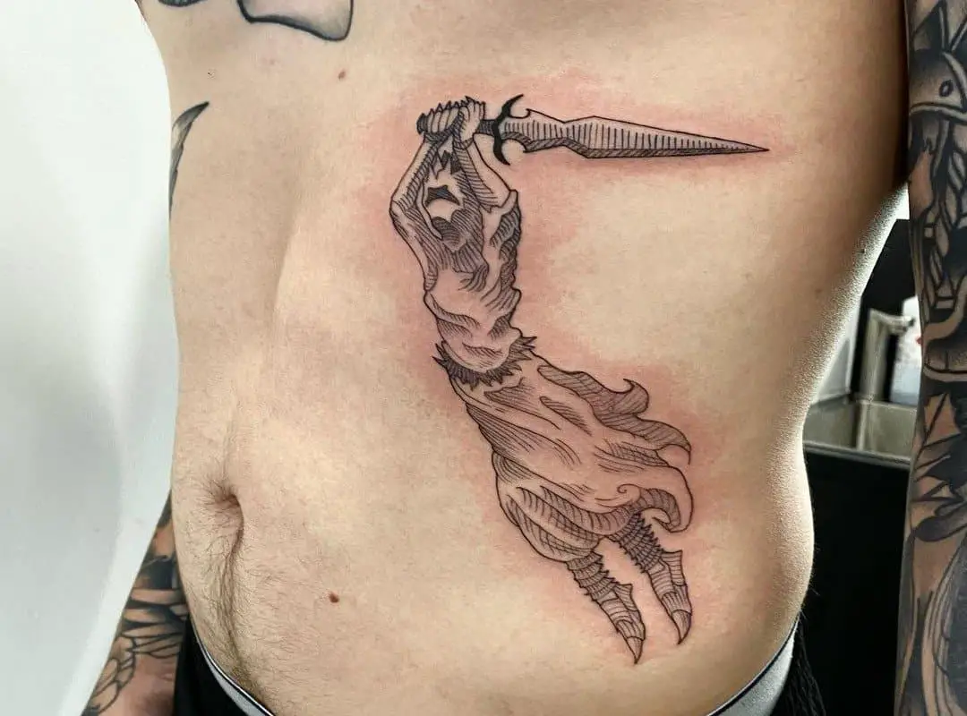 A tattoo of a knight swinging a sword 