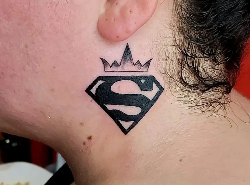 Superman logo tattoo with crown