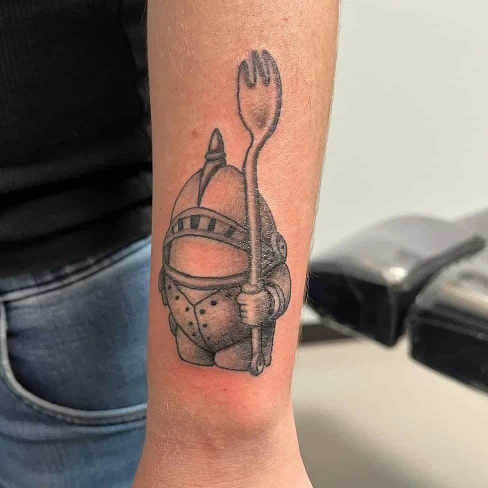 A tattoo of a funny little knight